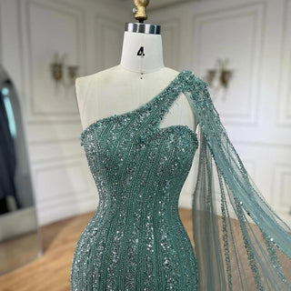 Ships in 1 to 3 Days - Turquoise Mermaid Luxury Beaded Evening Gown 2024 with One-Shoulder Cape Sleeves - Perfect for Women's Wedding Parties