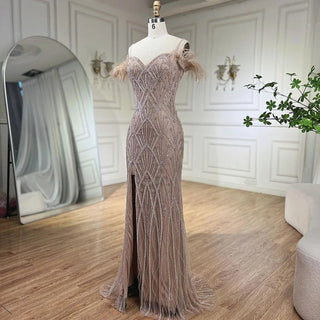 Nude Spaghetti Straps Elegant Mermaid Evening Gown 2024 with Luxury Beaded Feathers - Perfect for Women's Parties