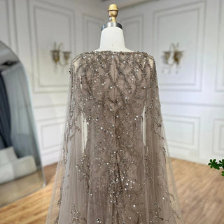 Gray Elegance: 2024 Mermaid Evening Gown with Cape Sleeves, Luxury Beading, and Arabic Inspiration