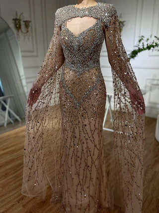 2024 Nude Mermaid Evening Gown with Beaded Crystal Detailing and Removable Cape Sleeves for Formal Occasions