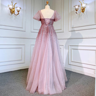 Desert Rose Elegance: Luxury Dubai-Inspired Evening Gown in Rose Pink with Burgundy & Gold Accents - An Arabic Masterpiece for Proms and Wedding Celebrations.