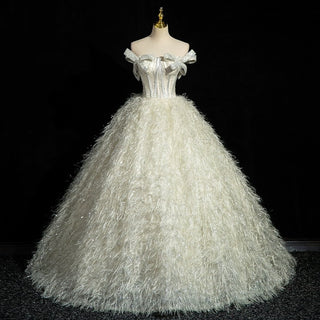 Opulent Feathered Ball Gown with Bow-Adorned Corset