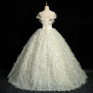 Opulent Feathered Ball Gown with Bow-Adorned Corset