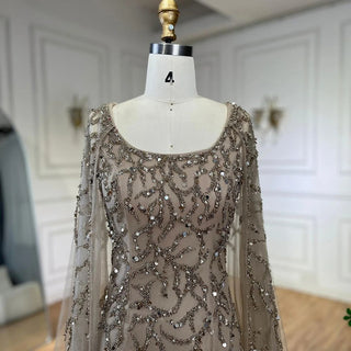 Gray Elegance: 2024 Mermaid Evening Gown with Cape Sleeves, Luxury Beading, and Arabic Inspiration