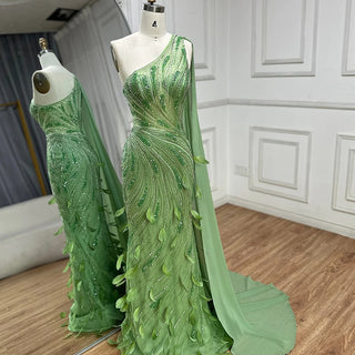 2025 Arabic Green One Shoulder Beaded Feathers Luxury Evening Gown with Side Cape Shawl for Women's Party