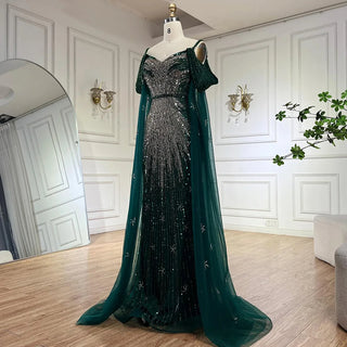 Ships in 1 to 3 Days - 2024 Spaghetti Strap Blue Mermaid Beaded Evening Gown with Cape Sleeves - Luxury Dress