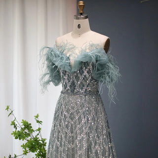 Emerald Enchantment: 2024 Dubai Feathered Gown with Elegant Off Shoulder Design for Wedding Celebrations.