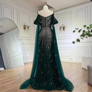 Ships in 1 to 3 Days - 2024 Spaghetti Strap Blue Mermaid Beaded Evening Gown with Cape Sleeves - Luxury Dress