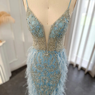 Champagne Dreams 2024: Luxury Feathered Mermaid Evening Dress with Spaghetti Straps, Perfect for Women at Weddings and Proms.