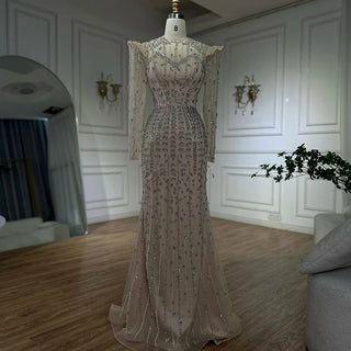 Luxury Nude Mermaid Evening Gown with Pearls and Beaded Embellishments – Custom Arabic Design