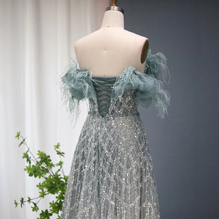 Emerald Enchantment: 2024 Dubai Feathered Gown with Elegant Off Shoulder Design for Wedding Celebrations.