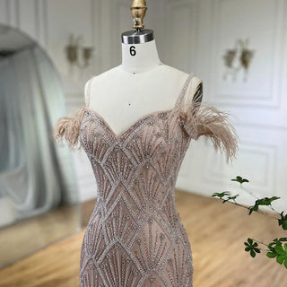 Nude Spaghetti Straps Elegant Mermaid Evening Gown 2024 with Luxury Beaded Feathers - Perfect for Women's Parties