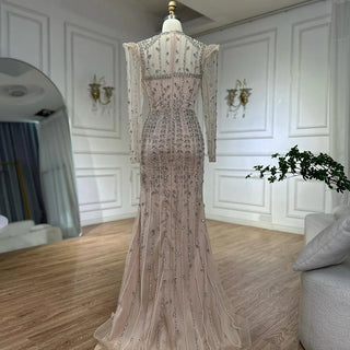 Luxury Nude Mermaid Evening Gown with Pearls and Beaded Embellishments – Custom Arabic Design