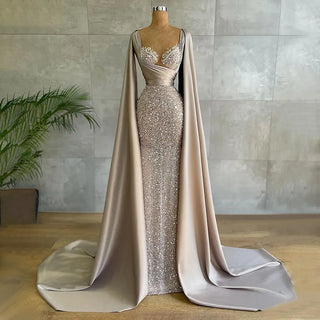 Champagne Elegance: 2024 Luxury Mermaid Evening Dress with Cape Sleeves and Beaded Embellishments