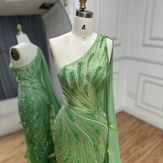 2025 Arabic Green One Shoulder Beaded Feathers Luxury Evening Gown with Side Cape Shawl for Women's Party