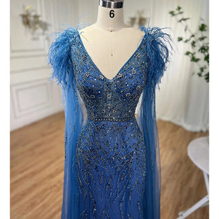 Arabic Blue Mermaid Elegant Cape Sleeves Feather Luxury Beaded Evening Dress - 2024 Collection