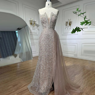 Desert Mirage: Nude High Split Mermaid Gown with Spaghetti Straps and Beading 2024