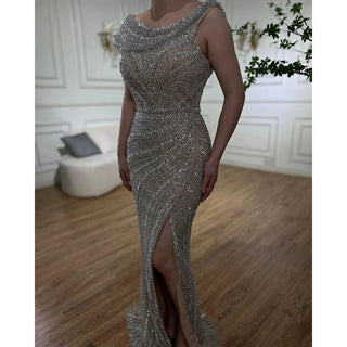 Luxury Silver Mermaid Dubai Evening Dress with Cape: Heavy Beaded Detail, Slit Prom Dresses for Women at Wedding Parties