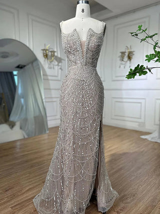 Desert Mirage: Nude High Split Mermaid Gown with Spaghetti Straps and Beading 2024