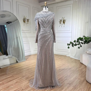 Luxury Silver Mermaid Dubai Evening Dress with Cape: Heavy Beaded Detail, Slit Prom Dresses for Women at Wedding Parties