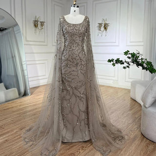 Gray Elegance: 2024 Mermaid Evening Gown with Cape Sleeves, Luxury Beading, and Arabic Inspiration