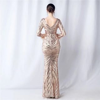 Stunning V-Neck Sequin Prom Dress with Feather-Trimmed Trumpet Skirt