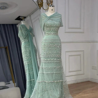 Saudi Arabic Sage Green Mermaid Evening Dress with Beaded Details and Long Cape for Formal Occasion