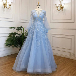 Dubai Crystal Feathers: Luxury Blue Evening Gown with Crystal Accents, Arabic-inspired Design, and Long Sleeves for Weddings, Parties, and Prom.