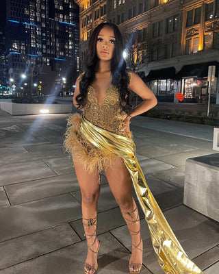 Golden Embellished Mini Dress with Feather Accents and Metallic Train