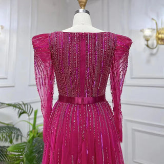 Dubai Fuchsia Elegance: Luxury Evening Dress with Long Sleeves, Overskirt, and Arabic-inspired Elegance for Women at Wedding Parties and Formal Events.