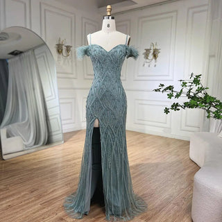 Nude Spaghetti Straps Elegant Mermaid Evening Gown 2024 with Luxury Beaded Feathers - Perfect for Women's Parties