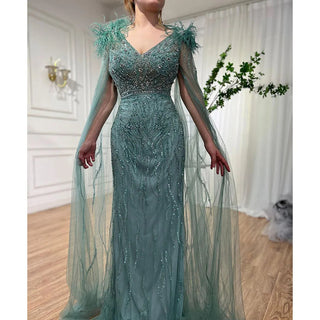 Arabic Blue Mermaid Elegant Cape Sleeves Feather Luxury Beaded Evening Dress - 2024 Collection