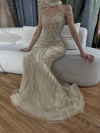 2024 Arabic Nude Halter Neck Mermaid Pearls Beaded Luxury Dubai Evening Gown for Women's Party