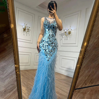 Azure Elegance: Light Blue Feathered Mermaid Dress for Prom, Weddings, and Graduation Events.