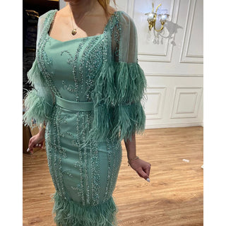 Luxury Turquoise Midi Evening Dress with Cape Sleeves 2024 - Beaded Feather Elegant Women's Party Gown