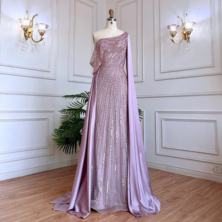 Golden Mirage: One-Shoulder Champagne Mermaid Evening Gown with Beaded Cape Sleeve - Dubai-Inspired Elegance for Arabic Weddings and Grand Celebrations.