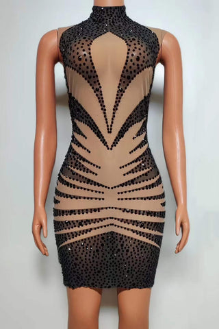 Sheer Illusion Bodycon Mini Dress with Black Sequin Embellishments