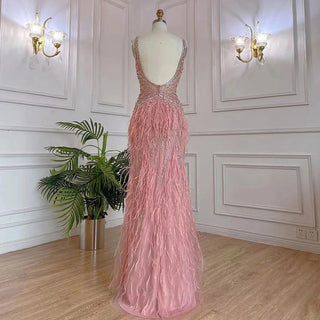 Dubai Pink Plume: Luxury Pink Feathered Evening Dress with Gold Accents and a V-Neck, Perfect for Women at Weddings and Formal Parties.