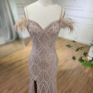 Nude Spaghetti Straps Elegant Mermaid Evening Gown 2024 with Luxury Beaded Feathers - Perfect for Women's Parties