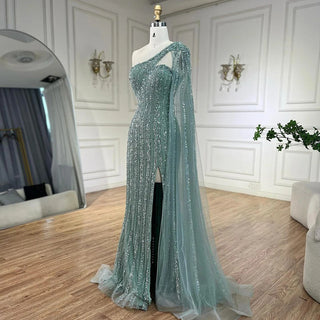 Ships in 1 to 3 Days - Turquoise Mermaid Luxury Beaded Evening Gown 2024 with One-Shoulder Cape Sleeves - Perfect for Women's Wedding Parties