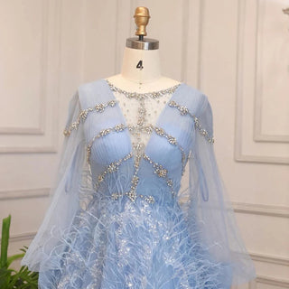 Dubai Crystal Feathers: Luxury Blue Evening Gown with Crystal Accents, Arabic-inspired Design, and Long Sleeves for Weddings, Parties, and Prom.