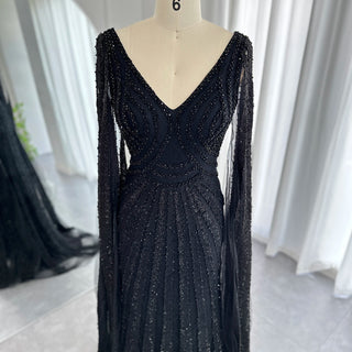 Exquisite 2024 Arabic Mermaid Evening Gowns in Luxurious Black: Featuring Cape Sleeves and Beaded Details for Women's Wedding and Party Attire in Dubai