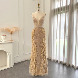 Champagne Dreams 2024: Luxury Feathered Mermaid Evening Dress with Spaghetti Straps, Perfect for Women at Weddings and Proms.