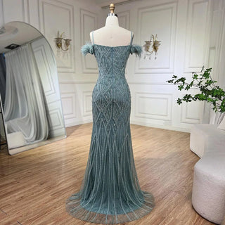 Nude Spaghetti Straps Elegant Mermaid Evening Gown 2024 with Luxury Beaded Feathers - Perfect for Women's Parties