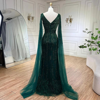 Midnight Majesty: 2024 Black Mermaid Evening Gown with Cape Sleeves and High Split - Luxury Beaded Feathers Dress for Women's Party