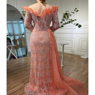 Elegant Arabic Peach Mermaid Evening Gown with Pearl and Beaded Detailing