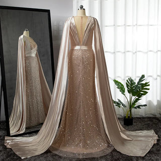 Champagne Elegance: 2024 Luxury Mermaid Evening Dress with Cape Sleeves and Beaded Embellishments