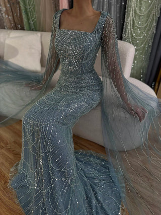 2024 Saudi Arabic Turquoise Mermaid Evening Dress - Beaded Pearls with Cape Sleeves for Formal Occasions