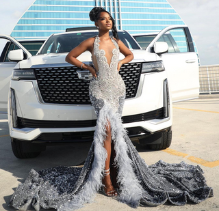 Feather-Trimmed Sequin Gown with Crystal-Embellished Bodice and High Slit