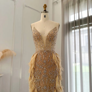 Champagne Dreams 2024: Luxury Feathered Mermaid Evening Dress with Spaghetti Straps, Perfect for Women at Weddings and Proms.